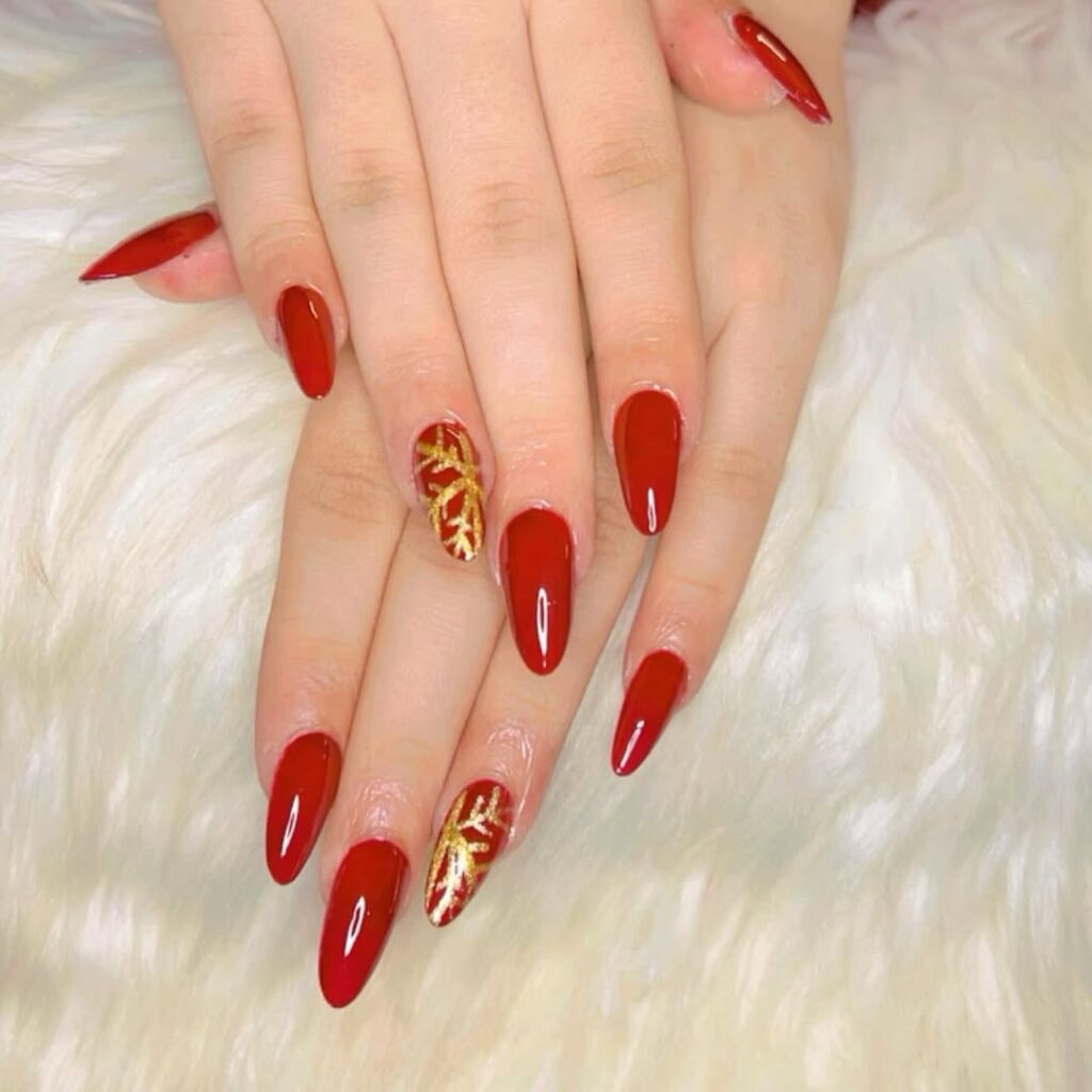 Snowflake and Snowman Almond Nails