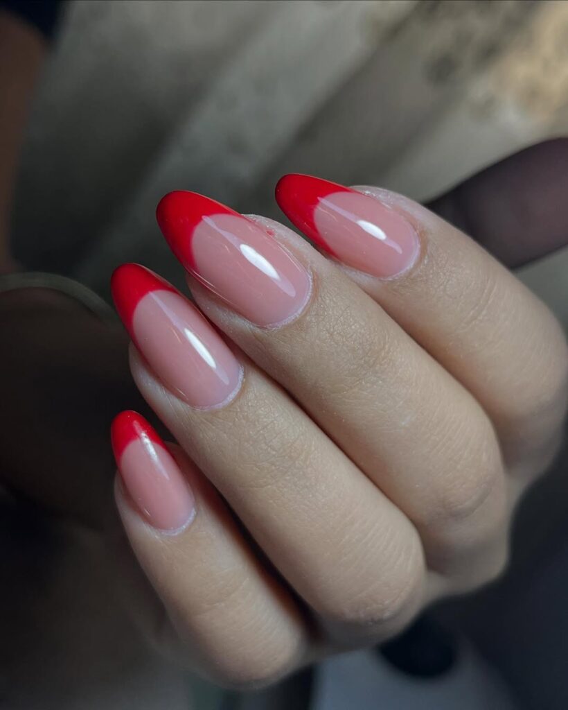 Stunning winter nails design featuring gel ombre nails with icy blue and white tones, perfect for the holiday season. 