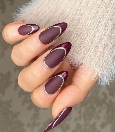 Dark red nail designs featuring glossy finishes, elegant accents, and a mix of matte and shiny textures for a bold, sophisticated look.