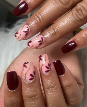 Short Maroon Nails with Leaf Designs